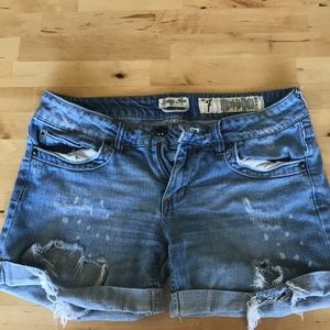 Rulers cuffed shorts with distress